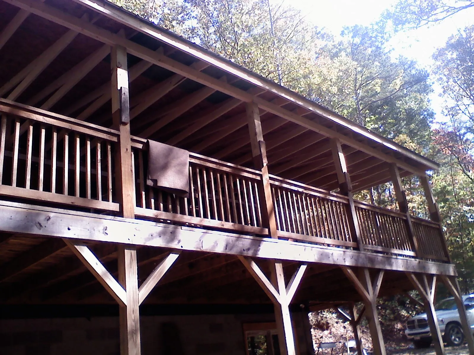 Timber framing under a new elevated porch and deck — Roof Leak Repair in Covina by Roofing Brothers